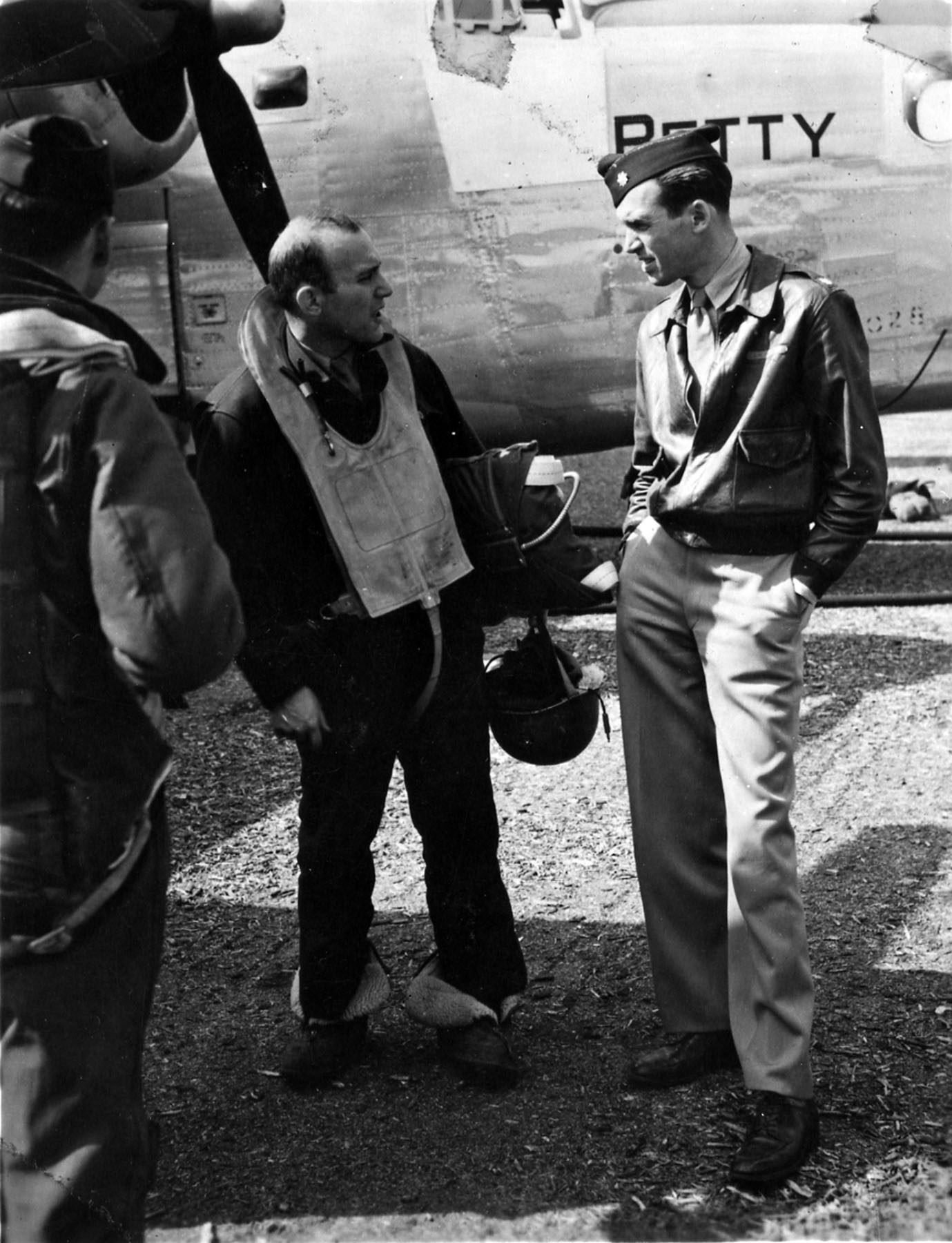Maj. Jimmy Stewart confers with B 24 crew member